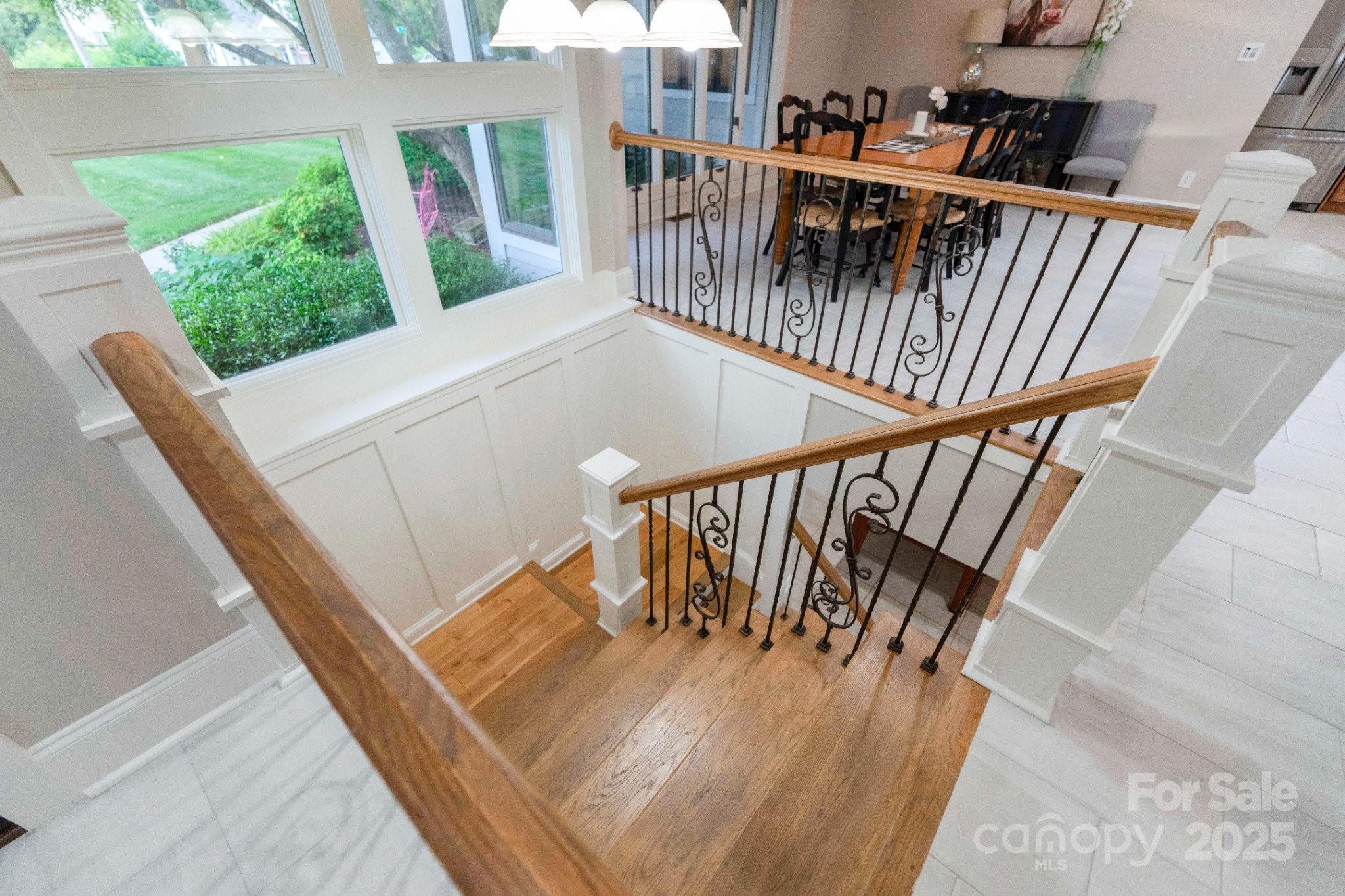 22501 John Gamble Road Cornelius, NC 28031 - Photo 29 of 47 a view of staircase with furniture and window