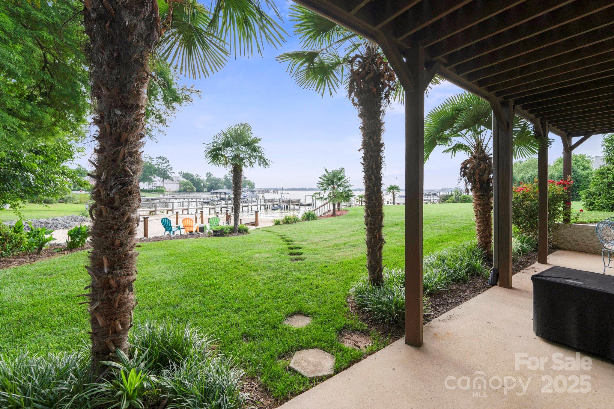 22501 John Gamble Road Cornelius, NC 28031 - Photo 41 of 47 a view of a porch with a backyard