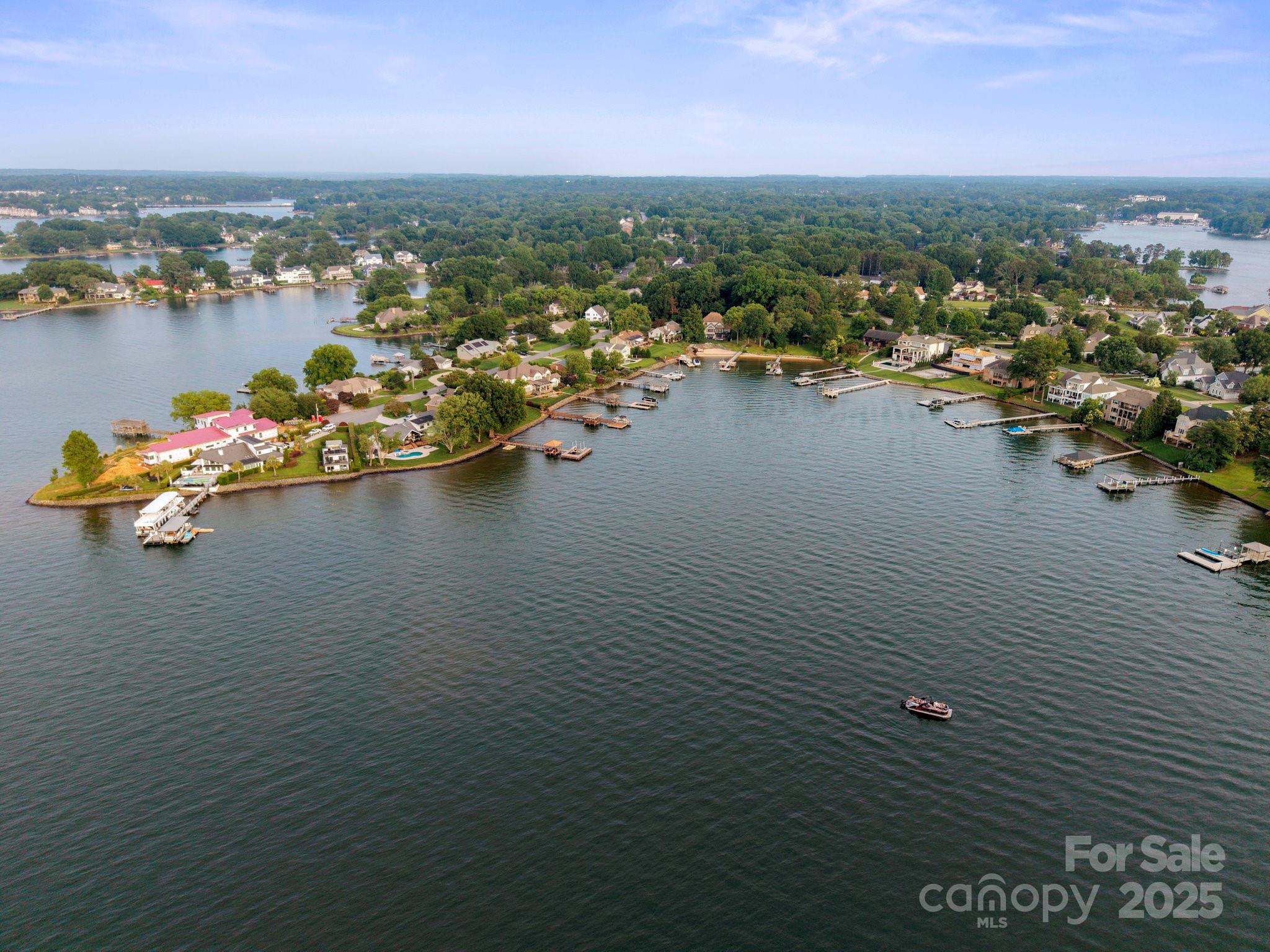 22501 John Gamble Road Cornelius, NC 28031 - Photo 46 of 47 an aerial view of a houses with city view
