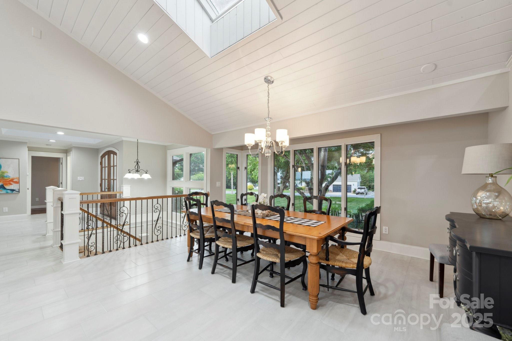 22501 John Gamble Road Cornelius, NC 28031 - Photo 10 of 47 a view of a dining room with furniture window and outside view