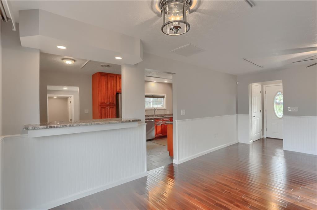 110 Oakville Road Beaver Falls, PA 15010 - Photo 15 of 48 a view of a room with wooden floor and staircase