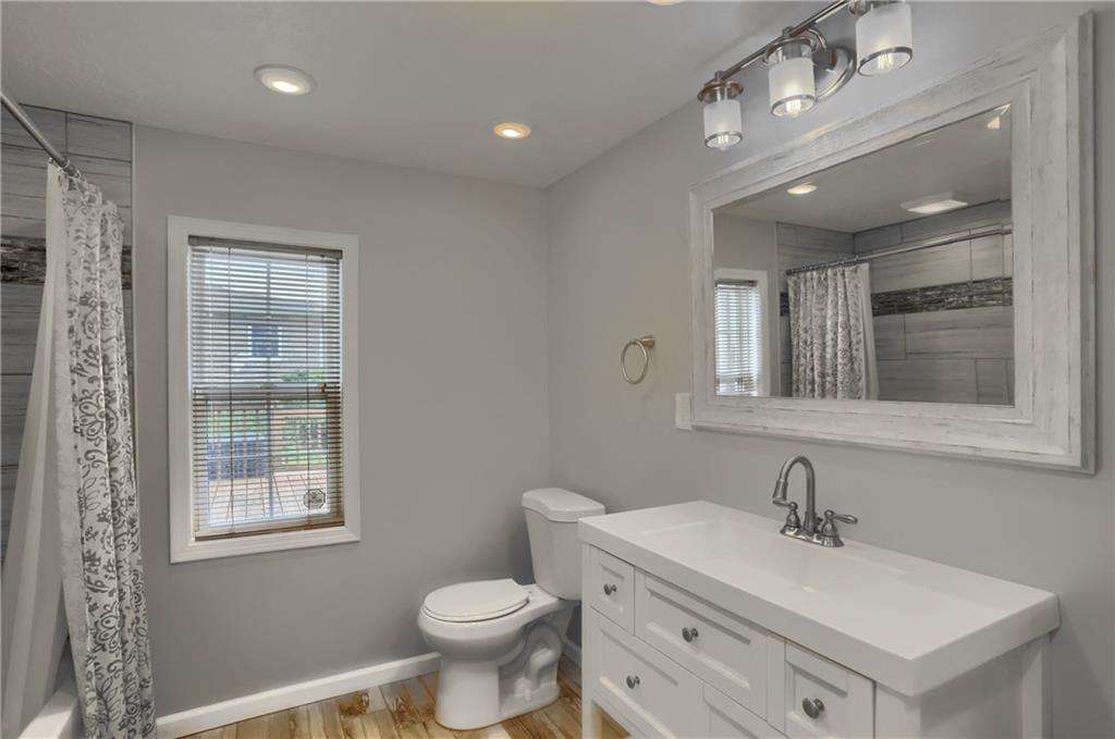 110 Oakville Road Beaver Falls, PA 15010 - Photo 29 of 48 a bathroom with a sink vanity mirror and toilet