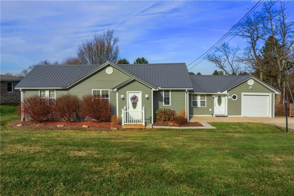 110 Oakville Road Beaver Falls, PA 15010 - Photo 3 of 48 a front view of a house with a yard