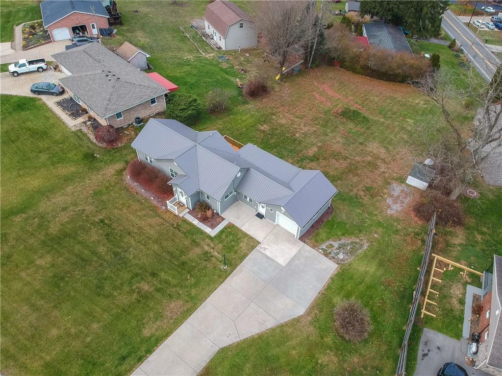 110 Oakville Road Beaver Falls, PA 15010 - Photo 41 of 48 an aerial view of a house with garden space and street view