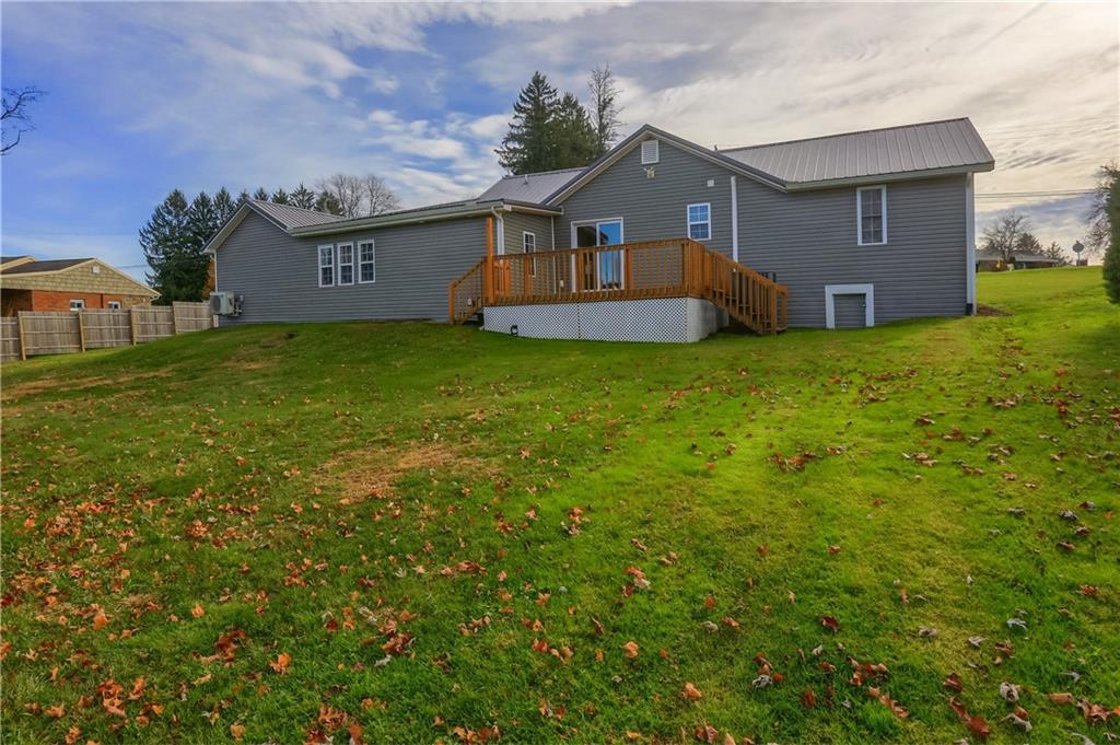 110 Oakville Road Beaver Falls, PA 15010 - Photo 42 of 48 a front view of a house with a garden