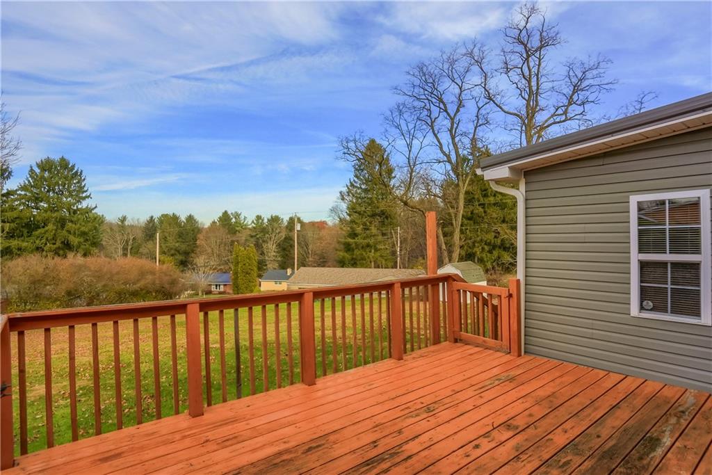 110 Oakville Road Beaver Falls, PA 15010 - Photo 44 of 48 a balcony with wooden floor and fence