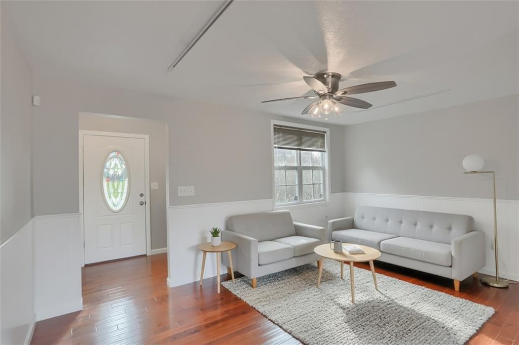 110 Oakville Road Beaver Falls, PA 15010 - Photo 6 of 48 a living room with furniture and a window
