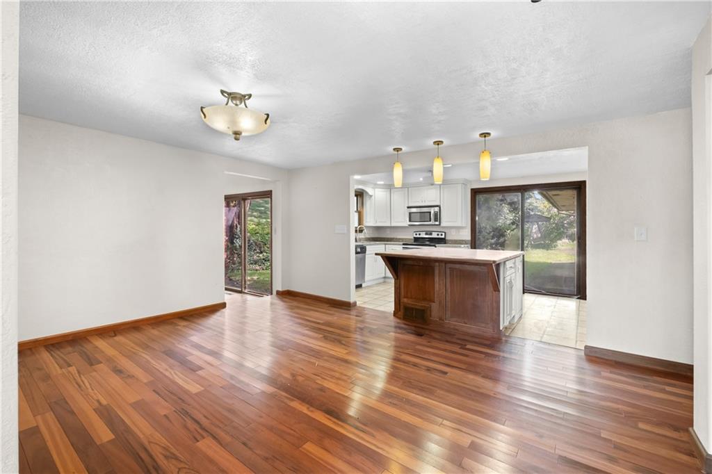 1003 Beacon Way Pittsburgh, PA 15241 - Photo 14 of 45 a view of kitchen with cabinets and wooden floor