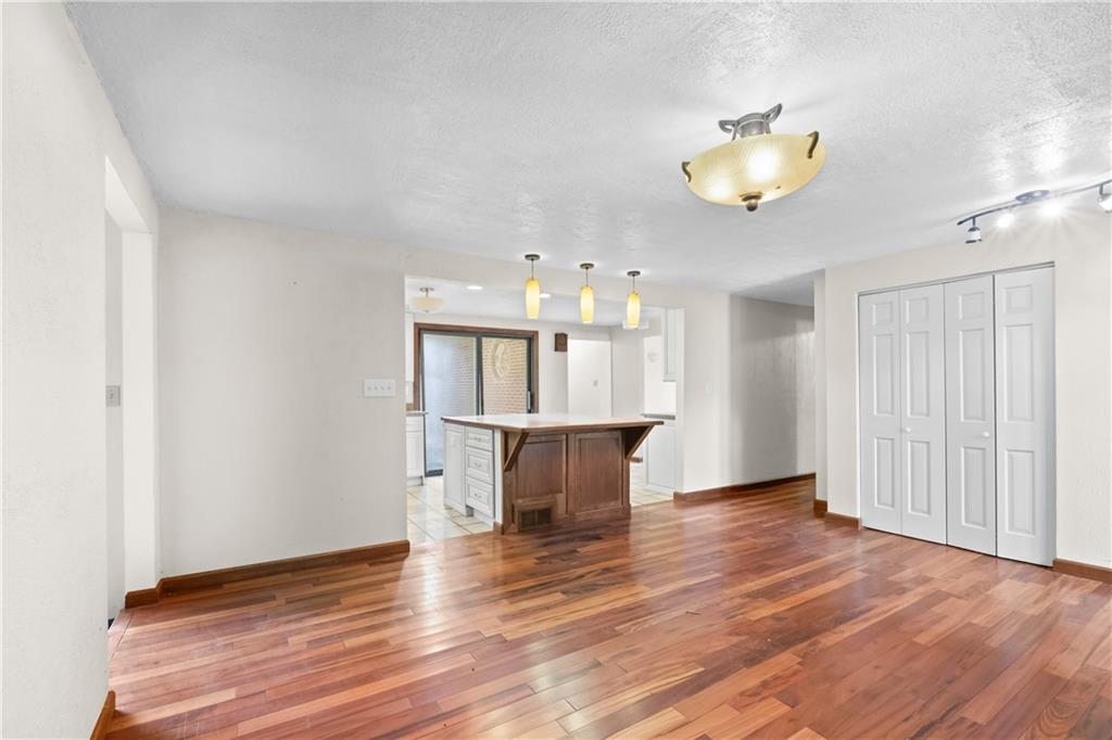 1003 Beacon Way Pittsburgh, PA 15241 - Photo 15 of 45 a view of an empty room and wooden floor
