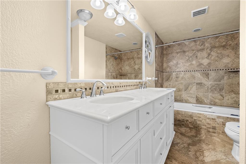 1003 Beacon Way Pittsburgh, PA 15241 - Photo 20 of 45 a bathroom with a sink a toilet and a bathtub