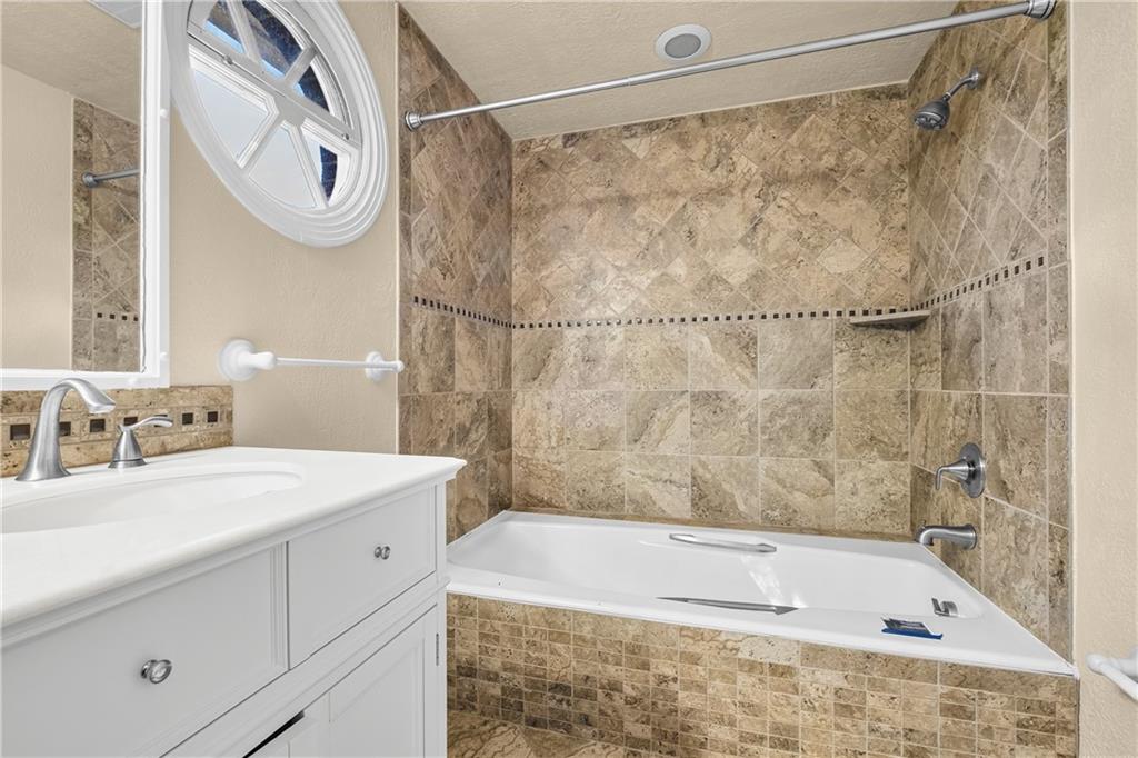 1003 Beacon Way Pittsburgh, PA 15241 - Photo 21 of 45 a bathroom with a sink and a bathtub