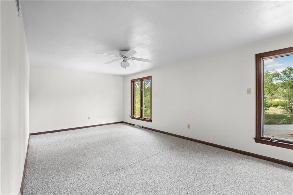 1003 Beacon Way Pittsburgh, PA 15241 - Photo 26 of 45 an empty room with windows and closet
