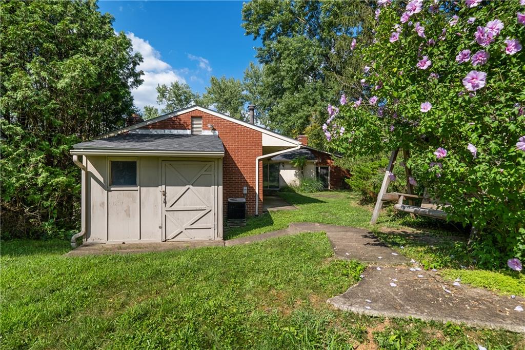 1003 Beacon Way Pittsburgh, PA 15241 - Photo 43 of 45 a house with green field in front of it