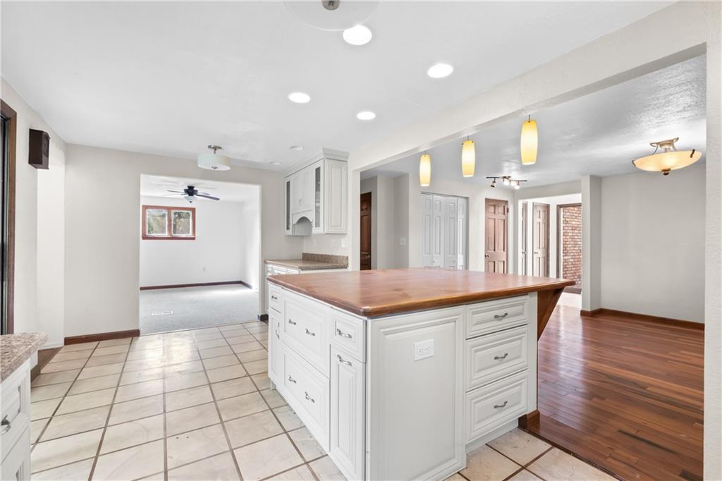 1003 Beacon Way Pittsburgh, PA 15241 - Photo 10 of 45 a kitchen with granite countertop a stove and a refrigerator