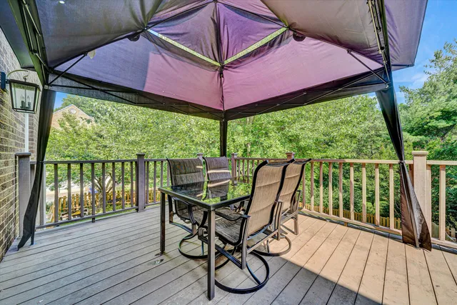 a balcony view with a seating space