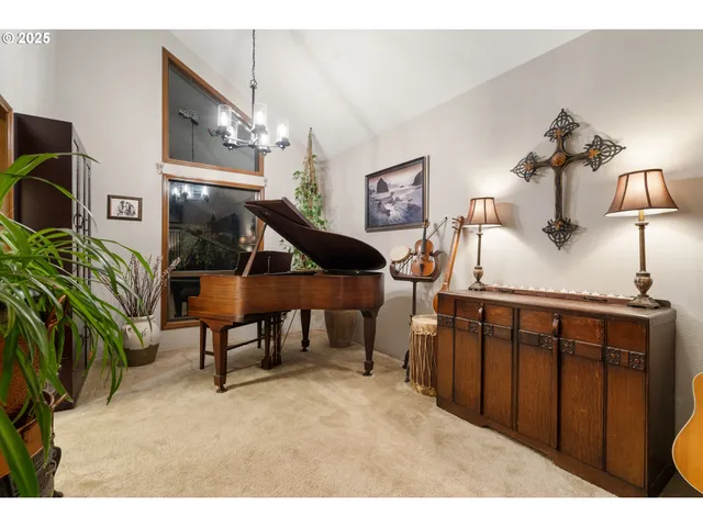 a kitchen with a stove a refrigerator and a sink