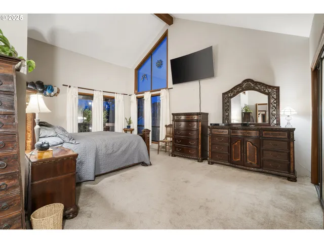 a view of a balcony with wooden floor