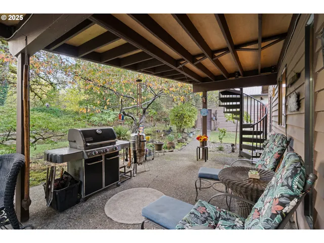 a view of yard with patio