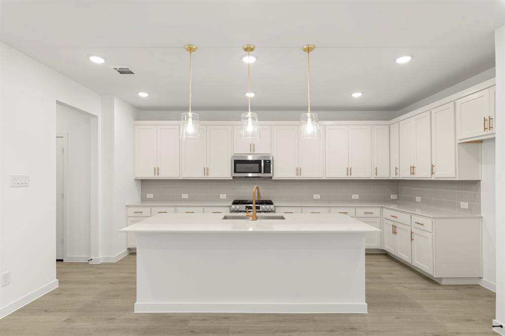 14157 Harden Street Pilot Point, TX 76258 - Photo 7 of 28 06. 14157 Harden - Kitchen