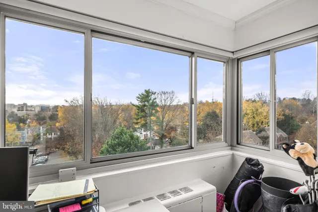 a room with furniture and a window