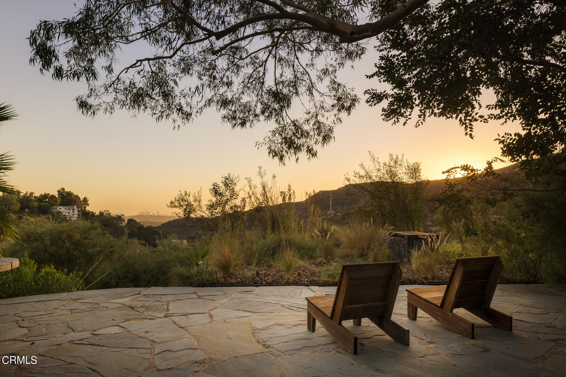 1338 Glen Oaks Boulevard Pasadena, CA 91105 - Photo 5 of 5 a view of a bench in a field