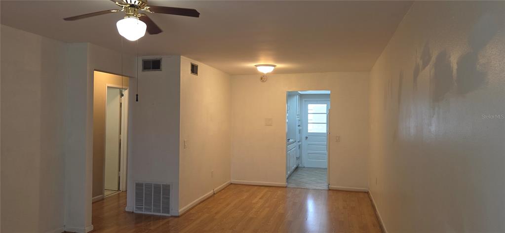 911 Washington Avenue Southwest, Unit 304 Largo, FL 33770 - Photo 7 of 26 a view of empty room with wooden floor