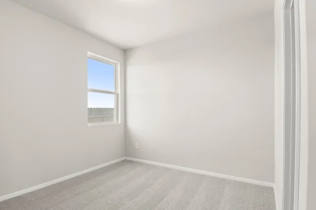 a view of a backyard with garage