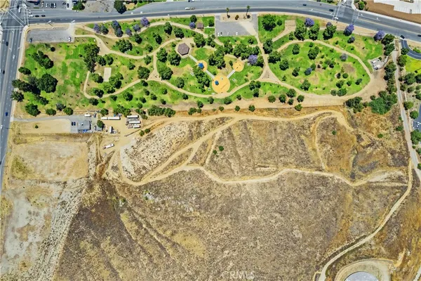 an aerial view of residential building and an ocean