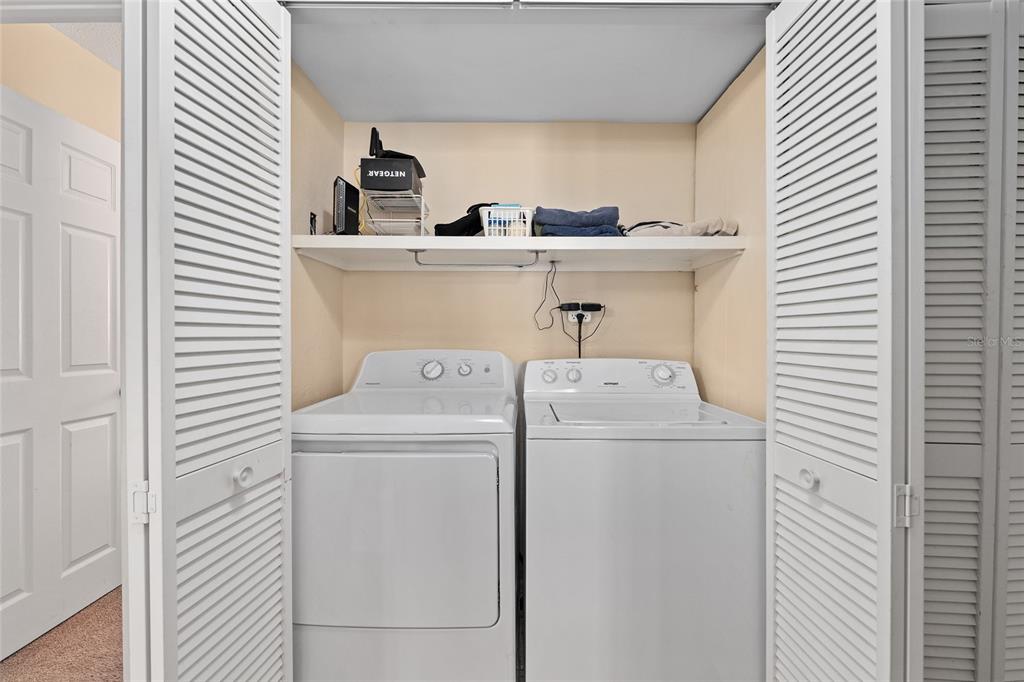 401 Northwest 39th Road, Unit 401C Gainesville, FL 32607 - Photo 21 of 62 a utility room with dryer and washer