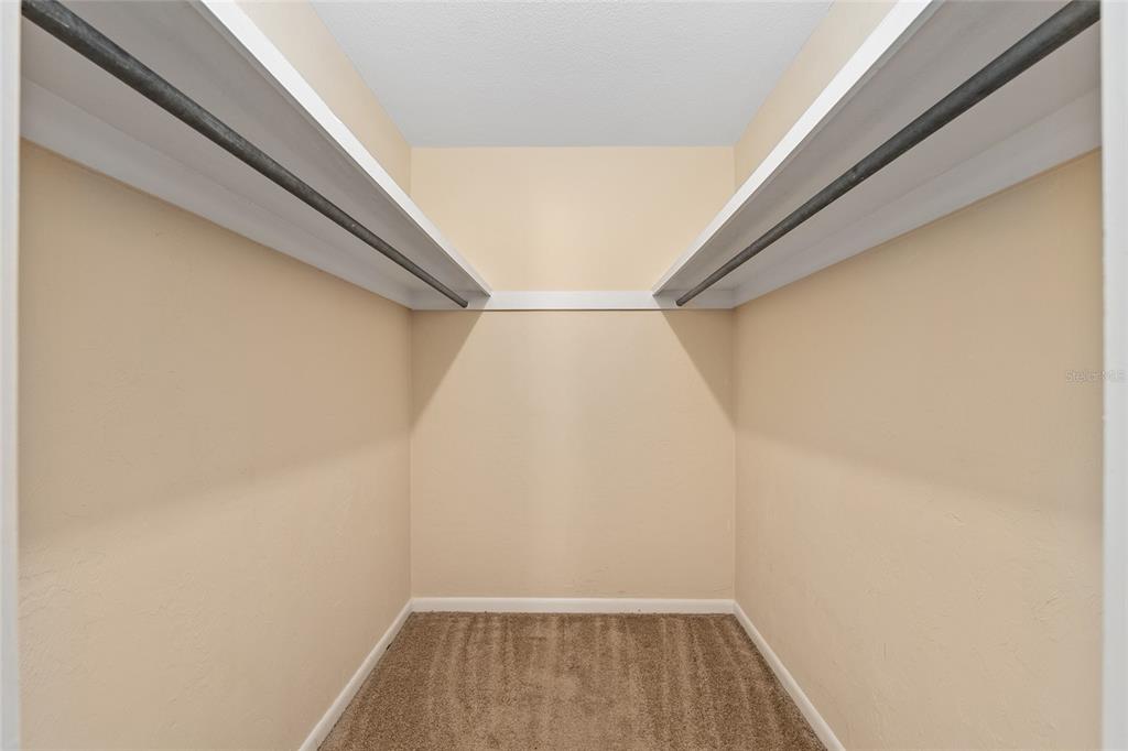 401 Northwest 39th Road, Unit 401C Gainesville, FL 32607 - Photo 28 of 62 a view of small space with racks on the wall