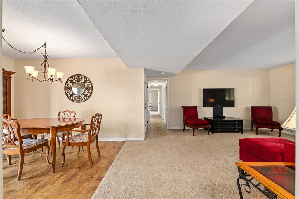 401 Northwest 39th Road, Unit 401C Gainesville, FL 32607 - Photo 3 of 62 a view of a livingroom with furniture and a chair