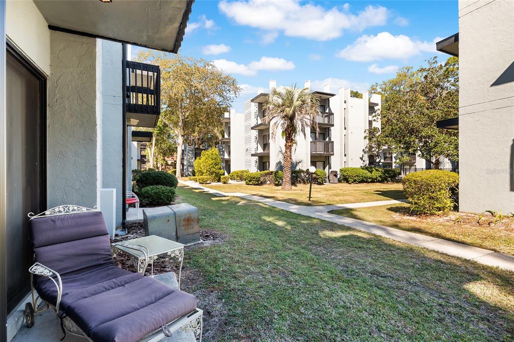 401 Northwest 39th Road, Unit 401C Gainesville, FL 32607 - Photo 38 of 62 a view of a building with backyard