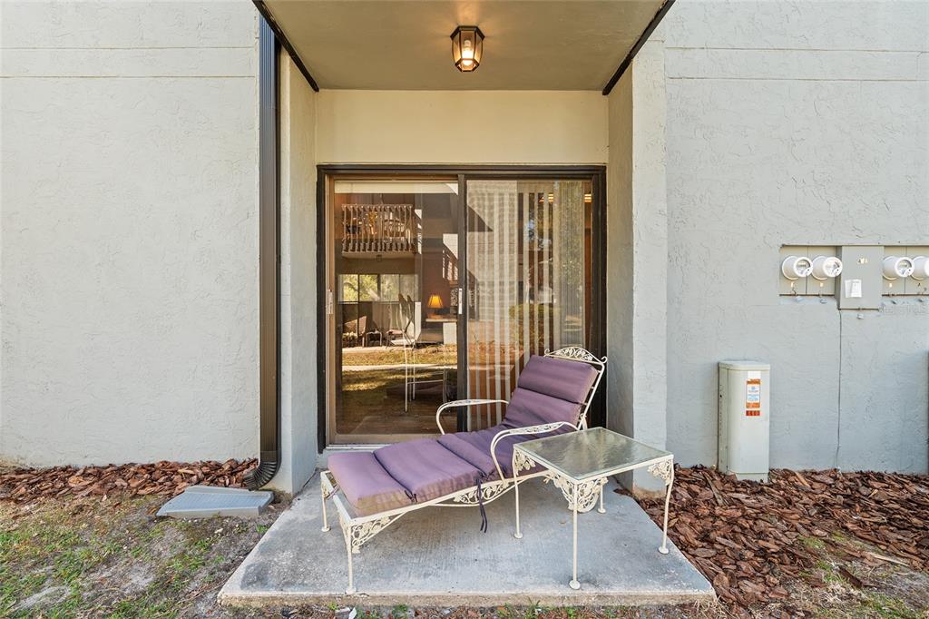 401 Northwest 39th Road, Unit 401C Gainesville, FL 32607 - Photo 39 of 62 a bedroom with a bed and wooden floor