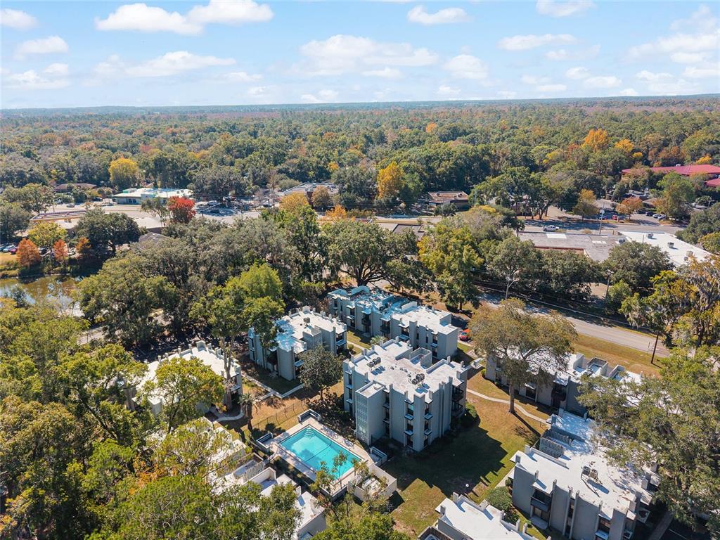 401 Northwest 39th Road, Unit 401C Gainesville, FL 32607 - Photo 56 of 62 an aerial view of a city with mountains