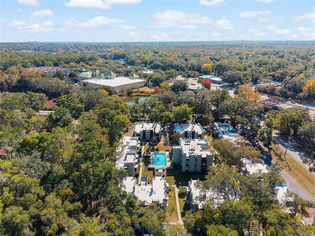 401 Northwest 39th Road, Unit 401C Gainesville, FL 32607 - Photo 57 of 62 an aerial view of a city with lots of residential buildings