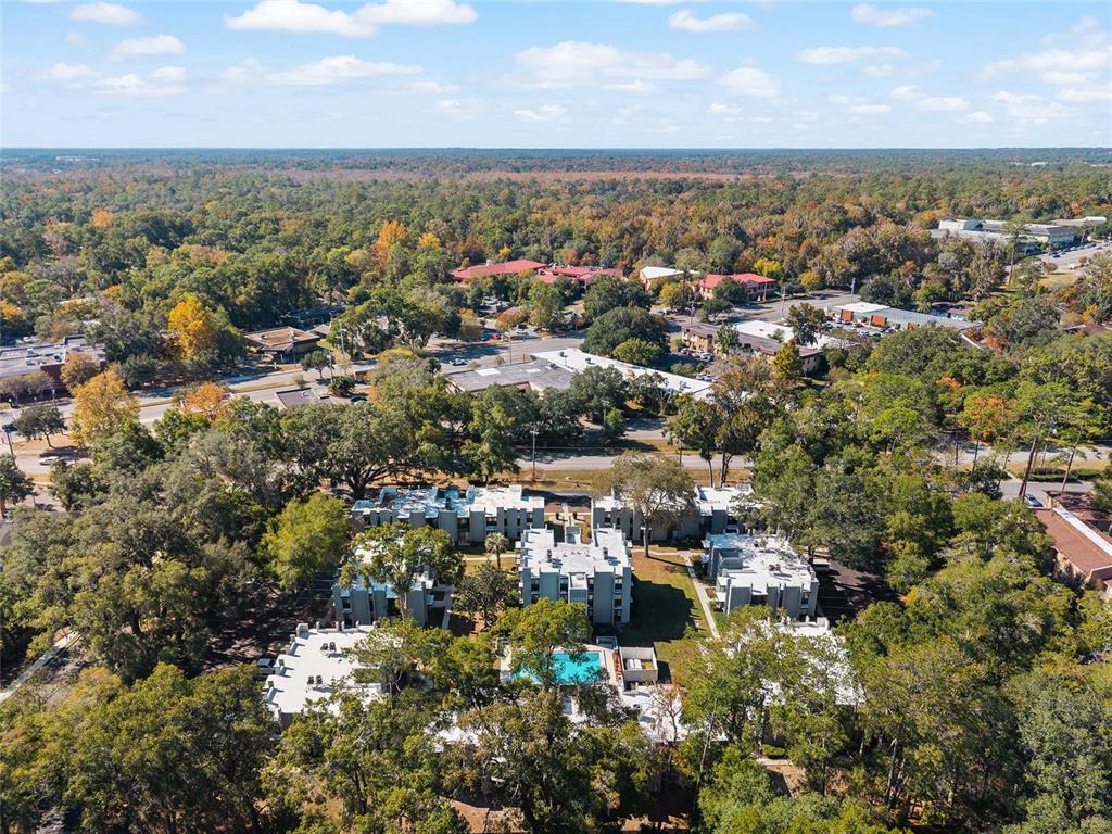 401 Northwest 39th Road, Unit 401C Gainesville, FL 32607 - Photo 58 of 62 an aerial view of multiple house