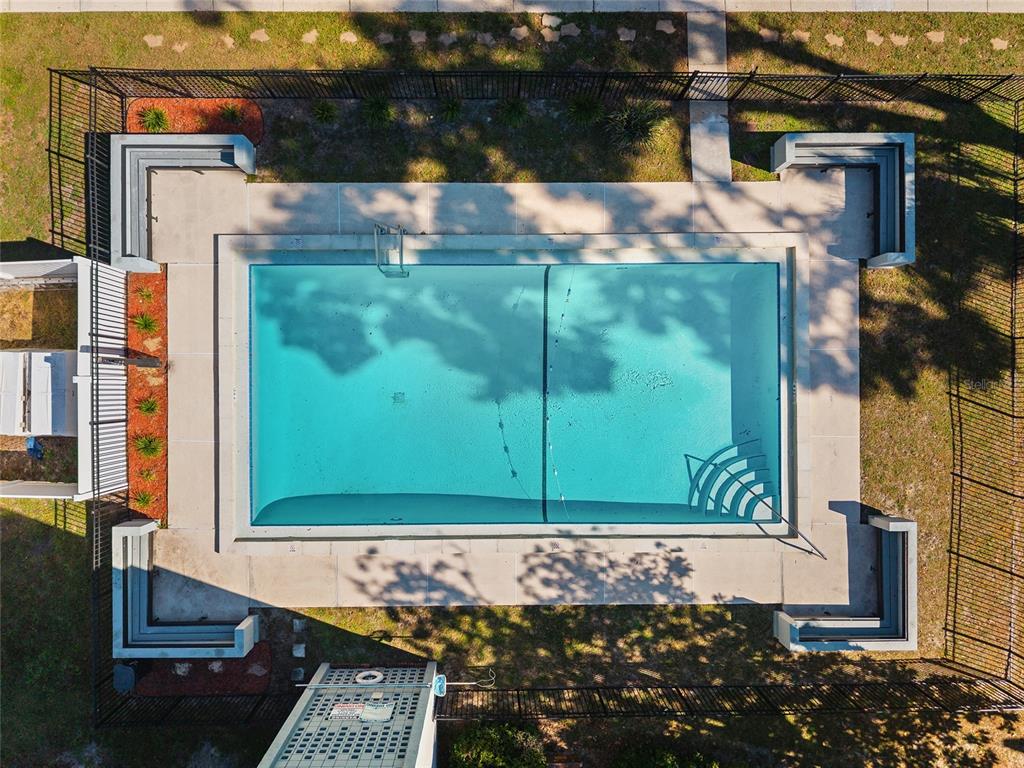 401 Northwest 39th Road, Unit 401C Gainesville, FL 32607 - Photo 59 of 62 a view of a street with cars parked on road