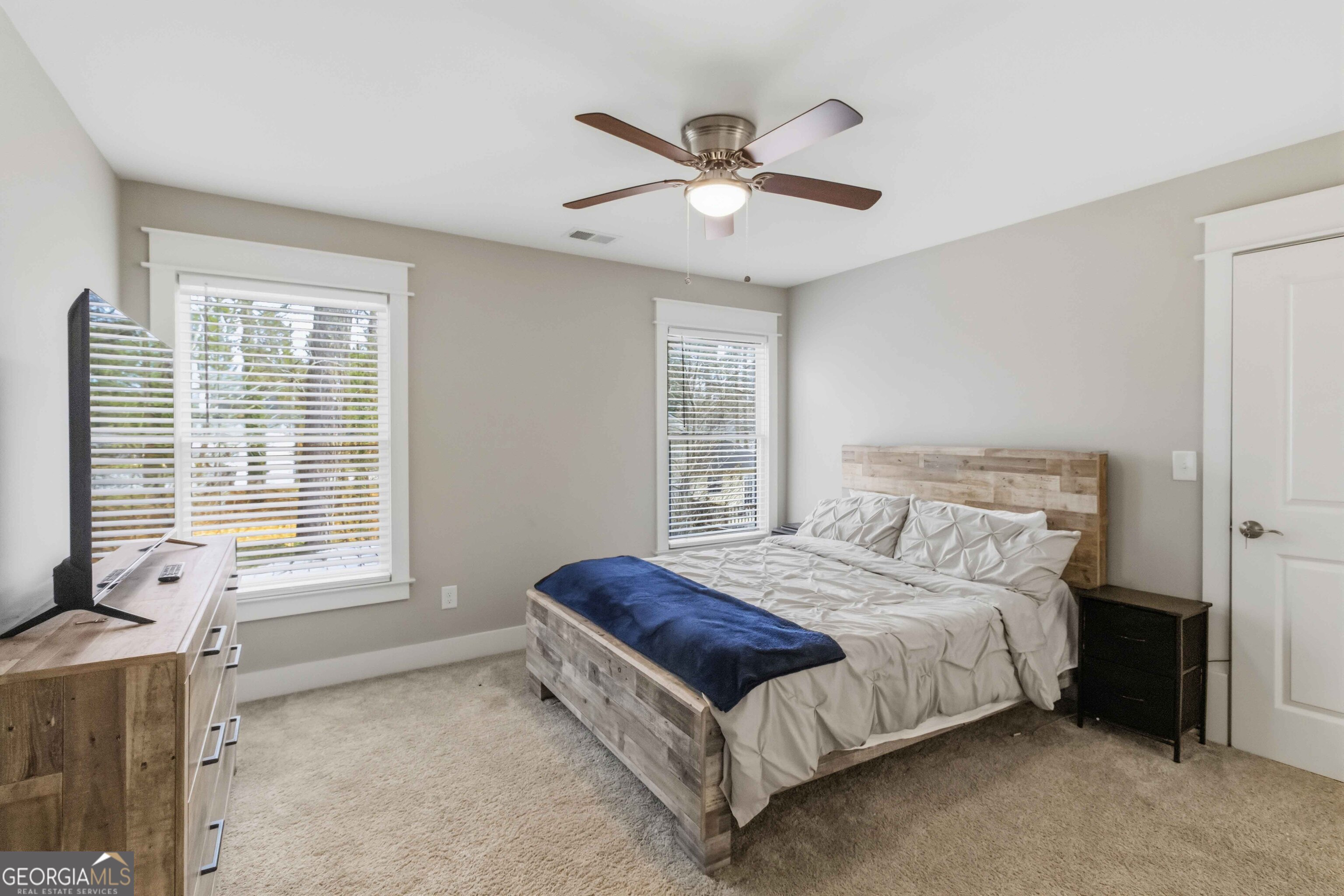 6247 Allen Ivey Road Mableton, GA 30126 - Photo 25 of 31 a bedroom with a bed and a window