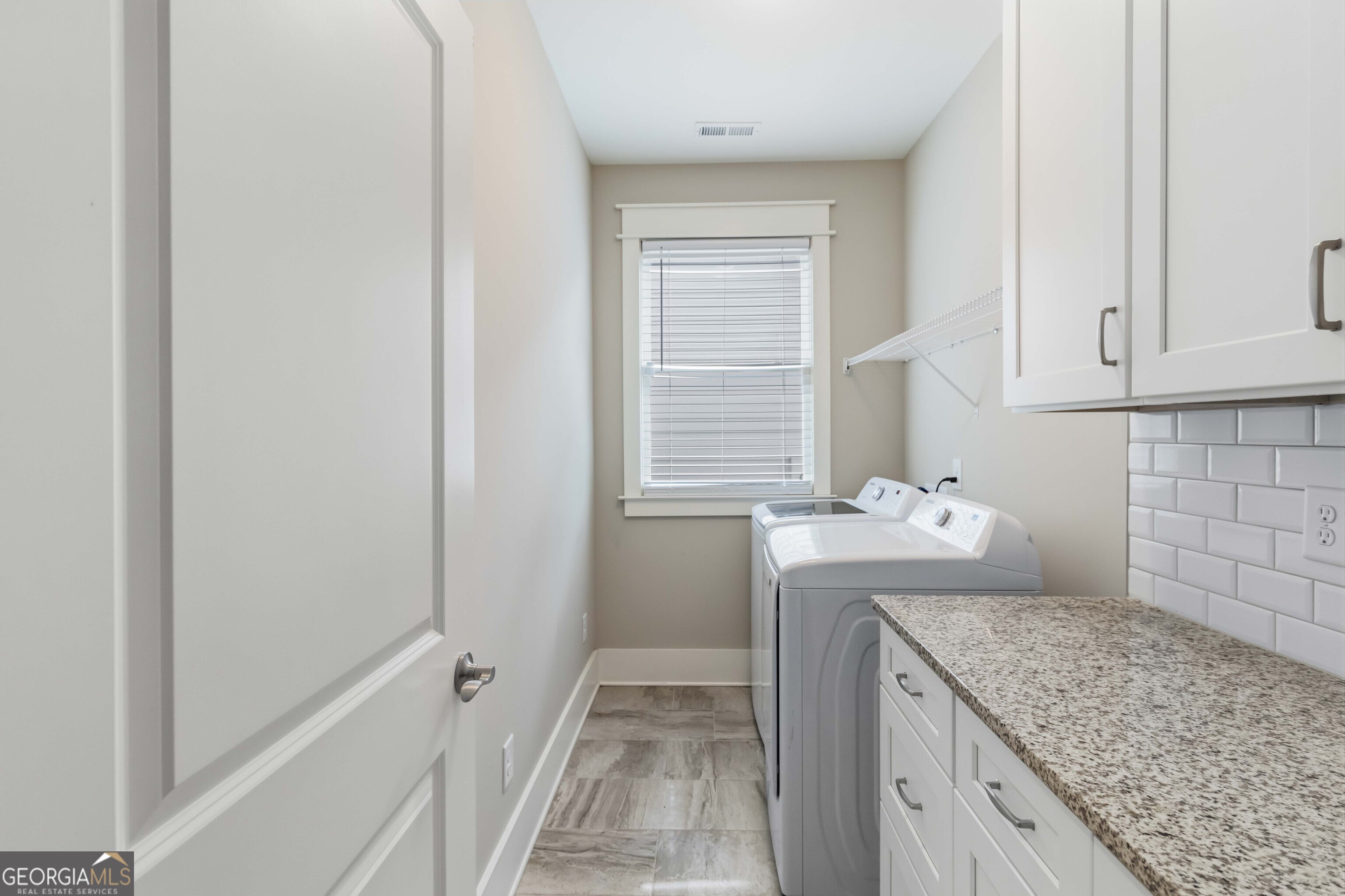 6247 Allen Ivey Road Mableton, GA 30126 - Photo 27 of 31 a utility room with washer and dryer