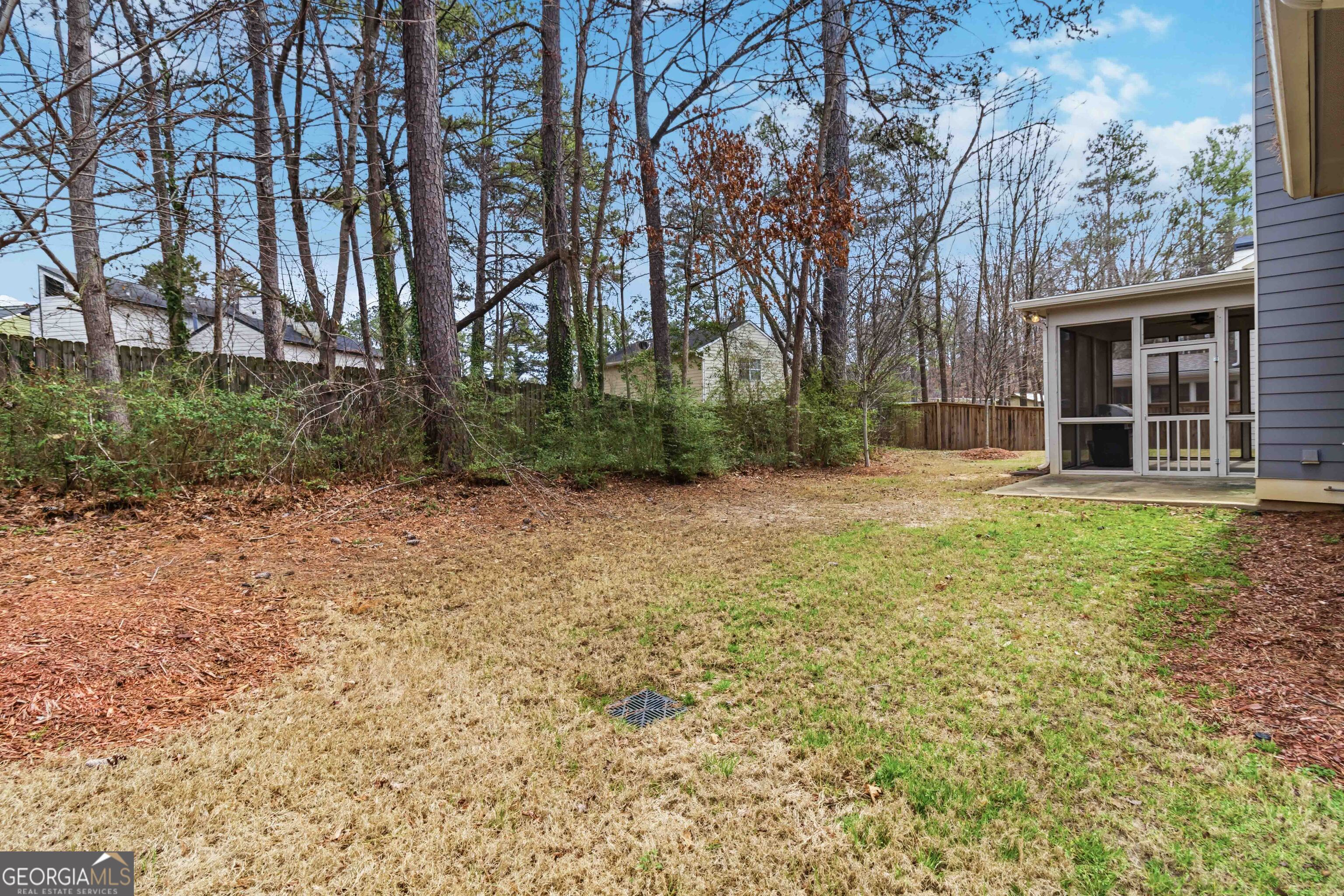 6247 Allen Ivey Road Mableton, GA 30126 - Photo 29 of 31 front view of a house with a yard