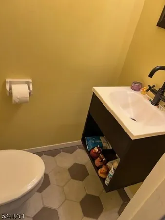 a bathroom with a sink and toilet