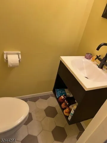 a bathroom with a sink and toilet