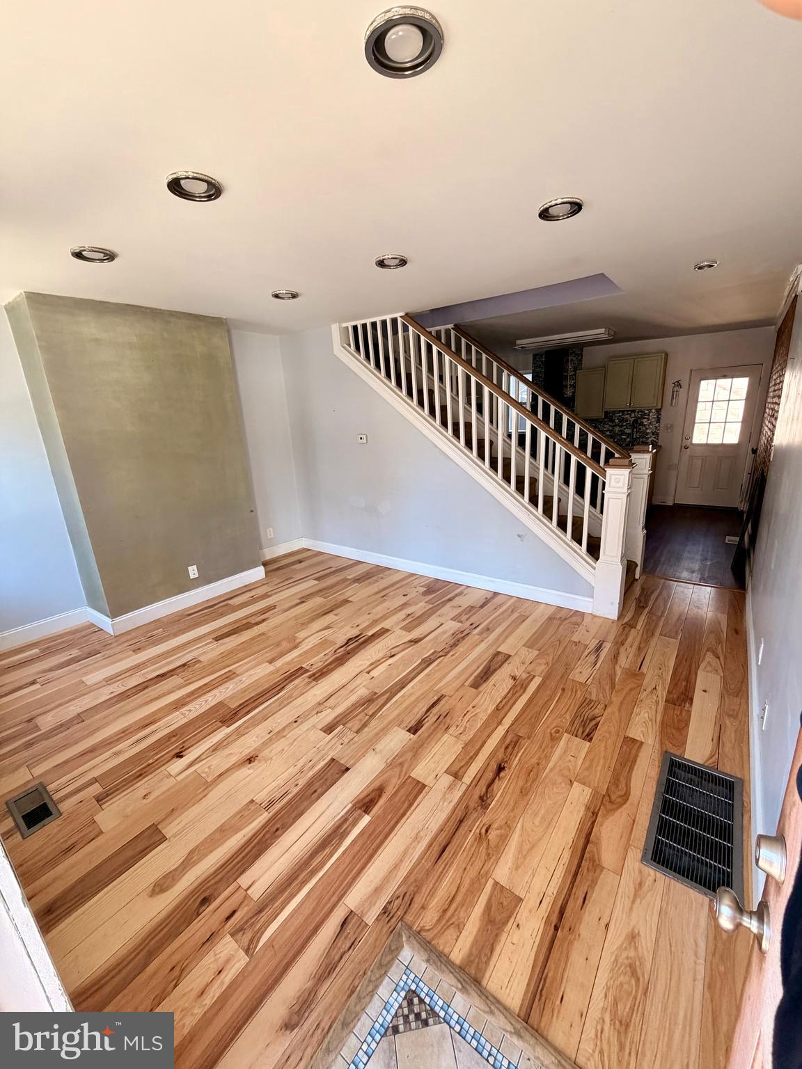 1944 Palethorp Street Philadelphia, PA 19122 - Photo 3 of 14 High ceiling, new hardwood floors, and lighting