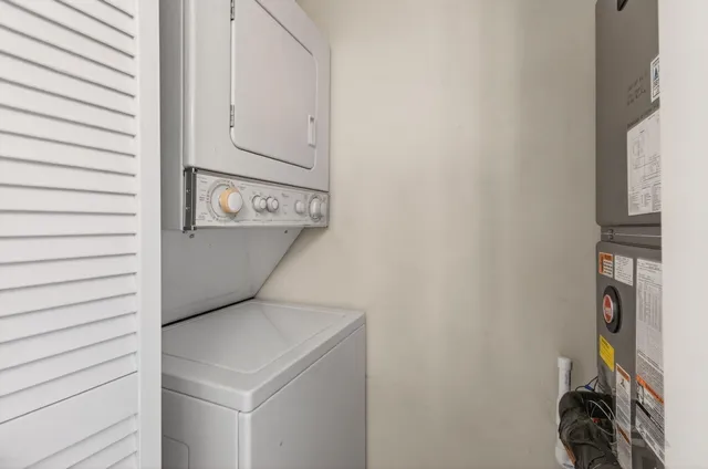 a bathroom with a sink a toilet and a shower