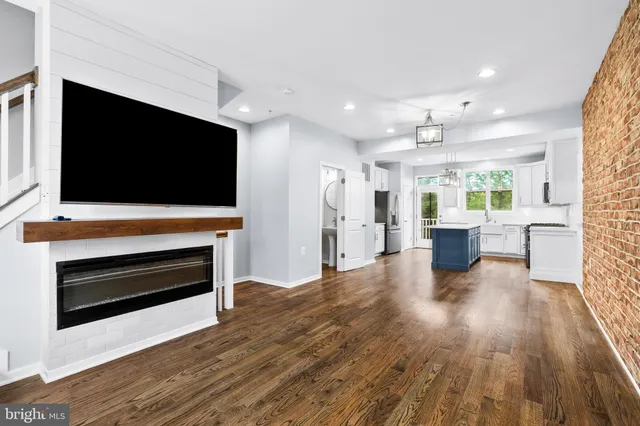 a view of living room with furniture and flat screen tv