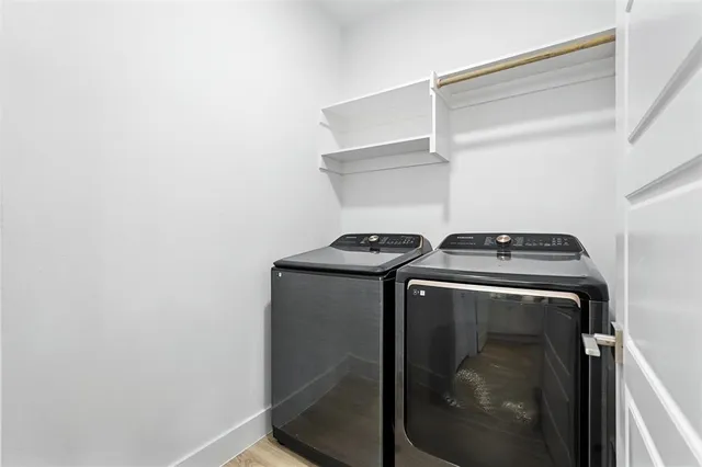 a utility room with dryer and washer