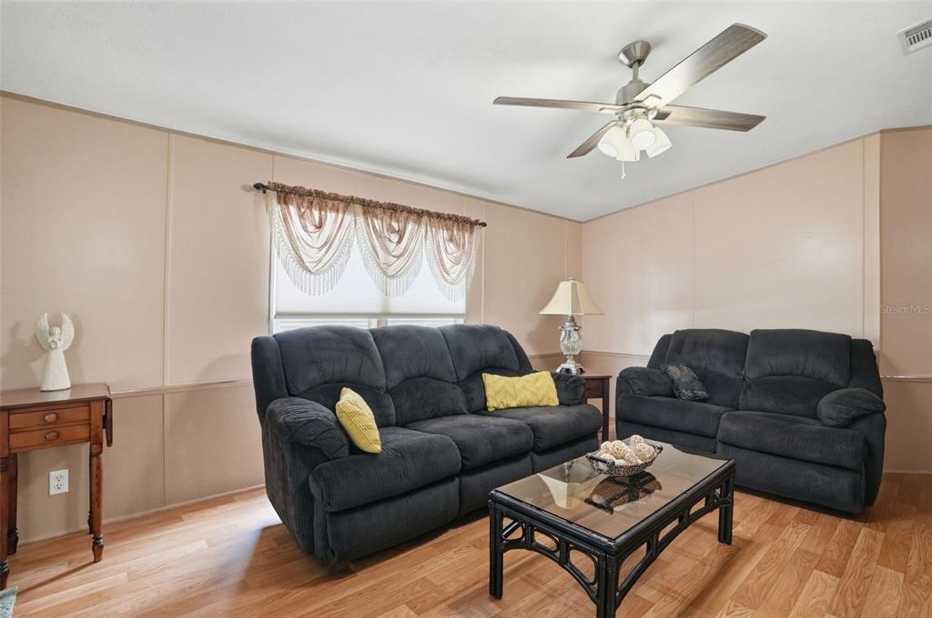 5161 Forest Glenn Drive Spring Hill, FL 34607 - Photo 14 of 51 a living room with furniture