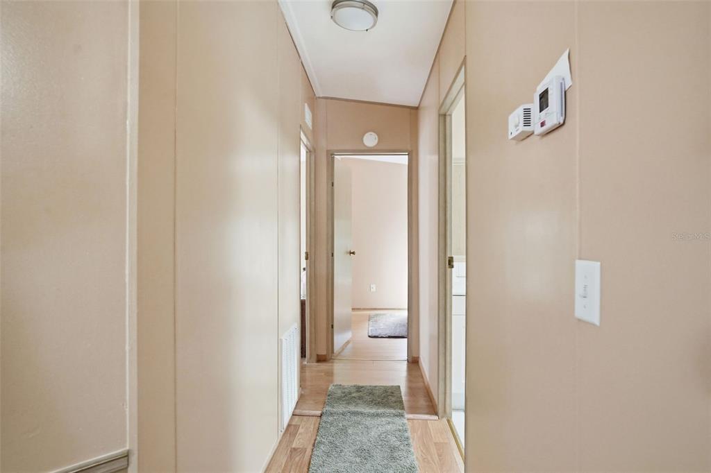 5161 Forest Glenn Drive Spring Hill, FL 34607 - Photo 16 of 51 a view of a bathroom from a hallway
