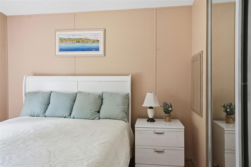5161 Forest Glenn Drive Spring Hill, FL 34607 - Photo 26 of 51 a bedroom with a bed and cabinet