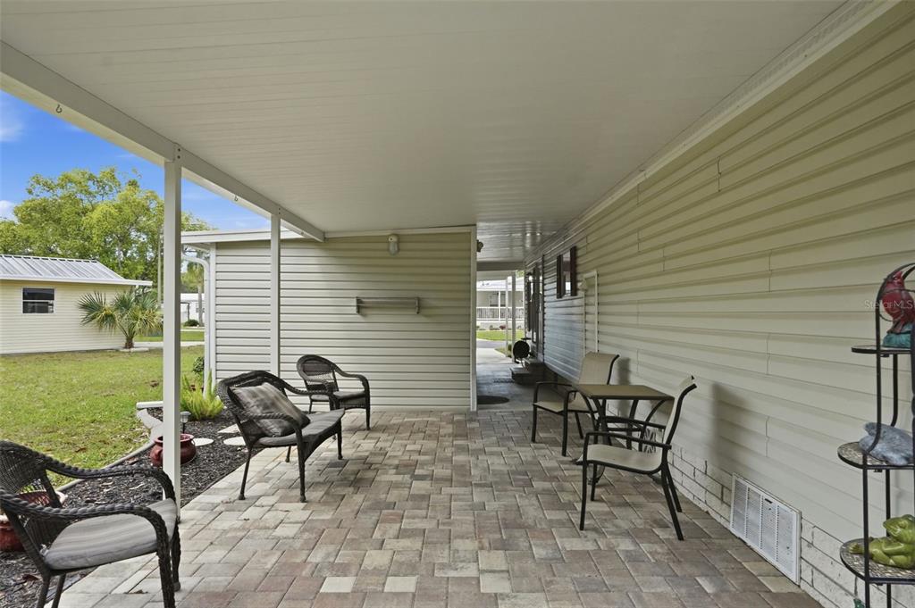 5161 Forest Glenn Drive Spring Hill, FL 34607 - Photo 35 of 51 a view of a chairs and table in patio